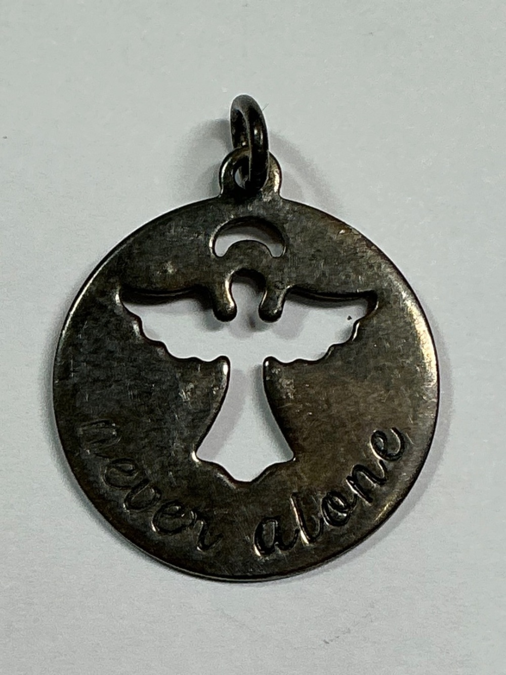 Sterling Silver Guarding Angel Cutout Round Pendant. 3/4 inch diameter